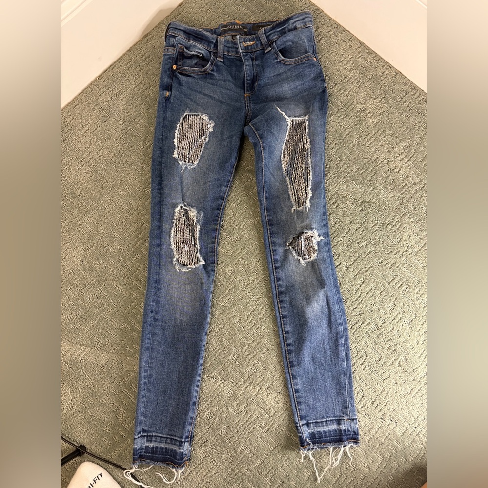 Girls skinny jeans. Ripped sequin jeans.